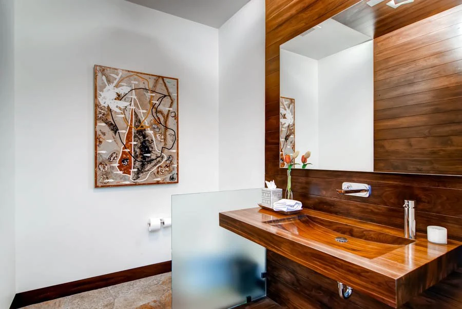 Bathroom sink with wood cabinetry